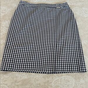 Brooks Brothers Navy White Gingham Skirt with front pleat at bottom.